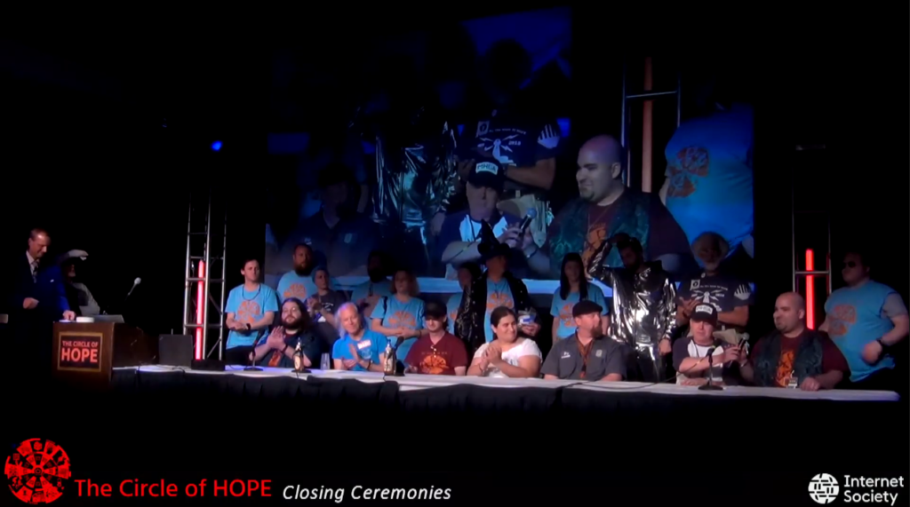 Staff lined up across the stage during the HOPE closing ceremonies in 2018. I'm second from the right.