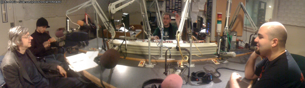 Panoramic photo of the "Off the Hook" radio studio and panelists taken just before showtime.